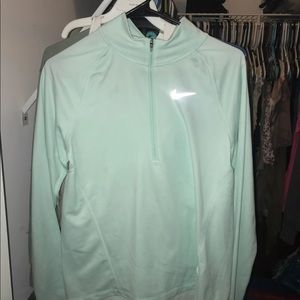 mint green nike half-zip